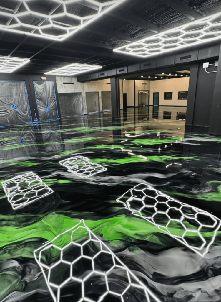 green and black metallic epoxy flooring for business