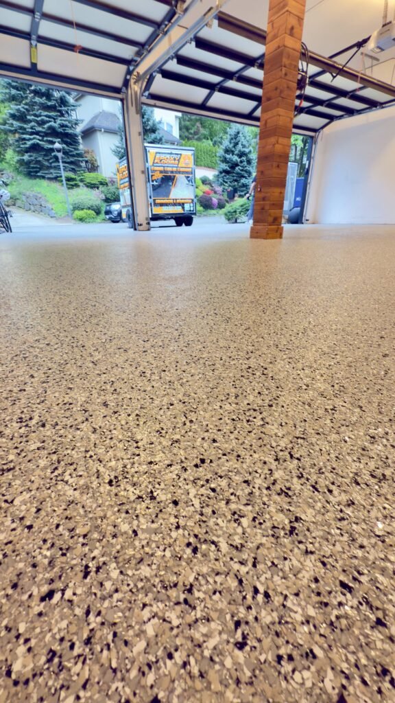 gray and white epoxy flake flooring in garage