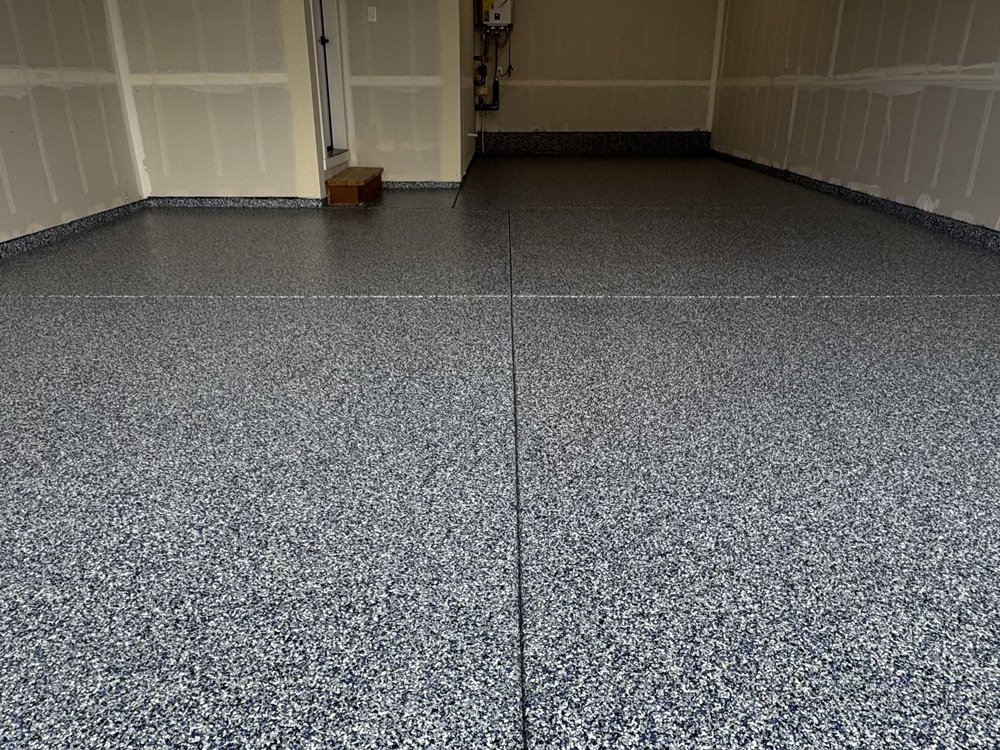 black and gray epoxy flake floor coating in garage