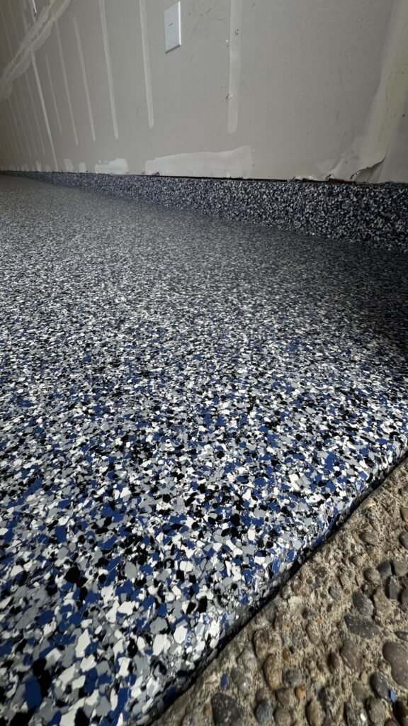 black and blue epoxy flake floor coating